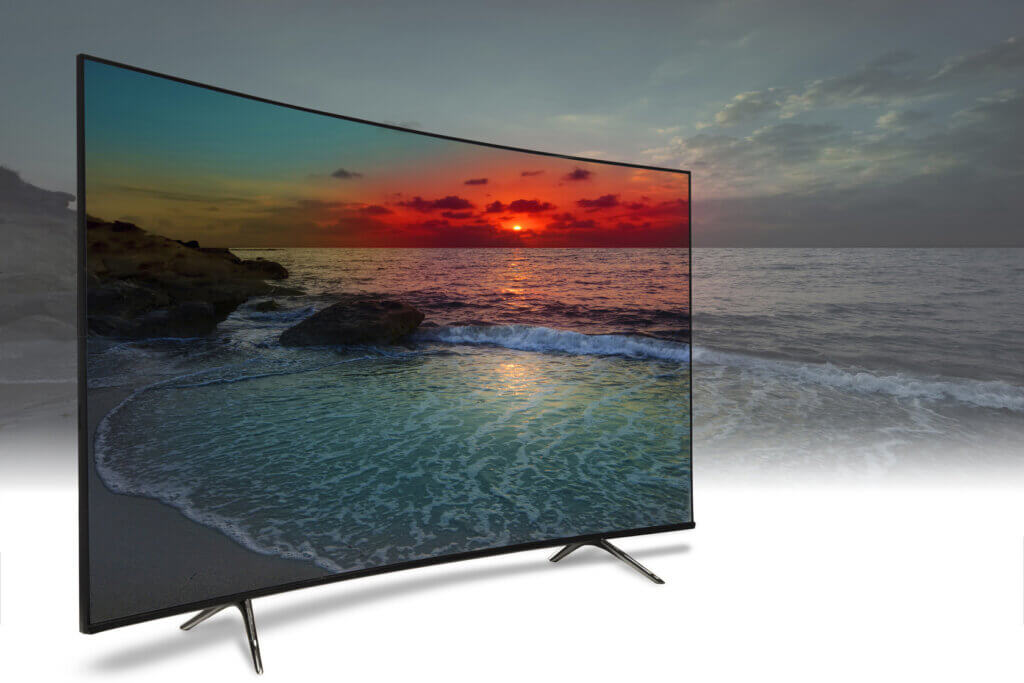 Fernseher am Strand am Abend