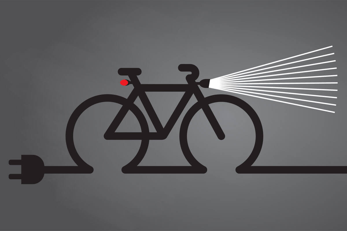 Symbol eines Fahrrads mit Vorder- und Ruecklicht