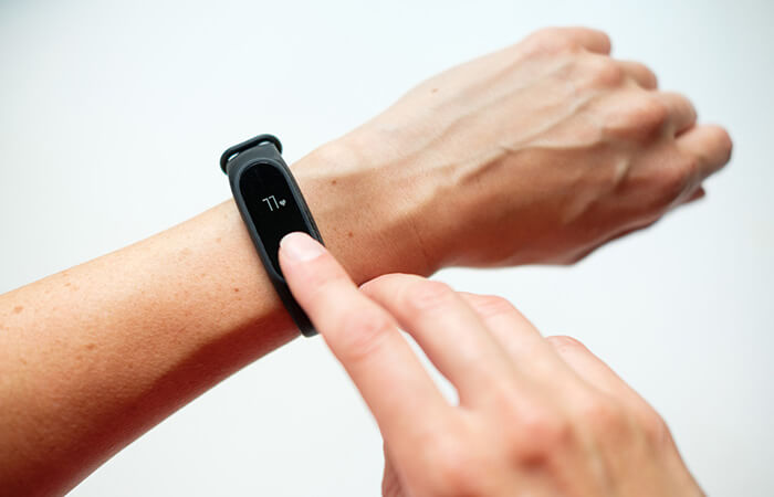 Arm mit Fitness Tracker